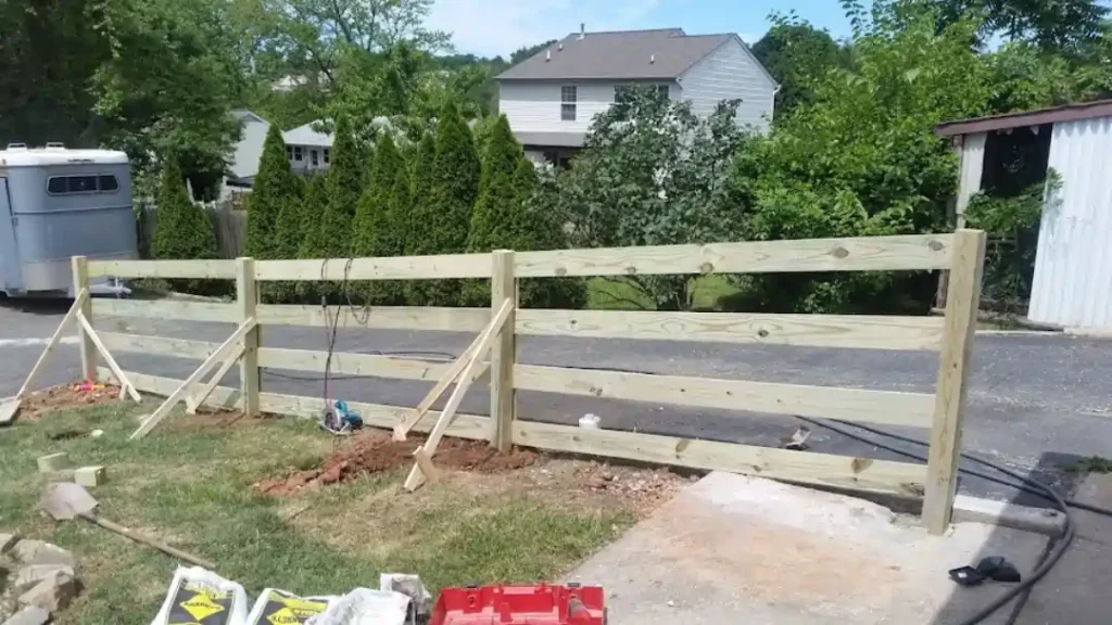 MSD Contractors - New three-rail split rail wooden fence installation in a residential yard