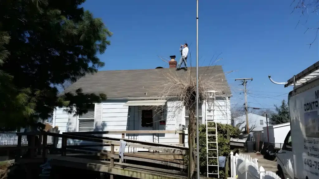 MSD Contractors - Roofing installation with contractor working