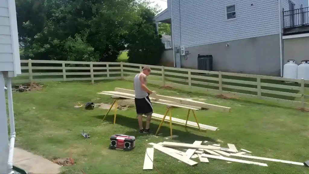 MSD Contractors - Skilled contractor building a wood fence