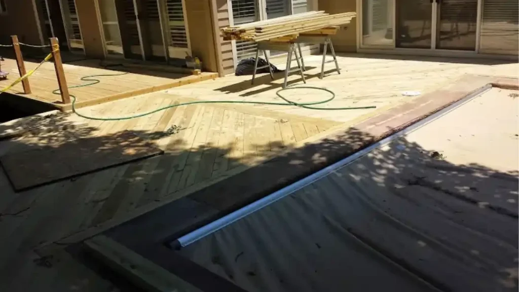 MSD Contractors - Poolside deck building in progress with diagonal design